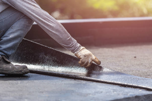 Professional Basement Waterproofing technician working in Utica, SC
